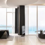 ห้องพัก Le Kamala ออกแบบพื้นที่นอนและ Living Space เชื่อมต่อกับวิวทะเลผ่านกระจกสูงเต็มบาน